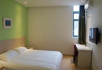 Motel 168 Shanghai Pudong Huinan Metro Station Tesco Esterno foto