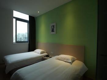 Motel 168 Shanghai Pudong Huinan Metro Station Tesco Esterno foto