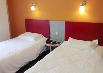 Motel 168 Shanghai Pudong Huinan Metro Station Tesco Esterno foto